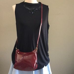 Small Authentic Coach Crossbody purse, dark red